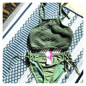 Green crochet halter top and string bikini set.